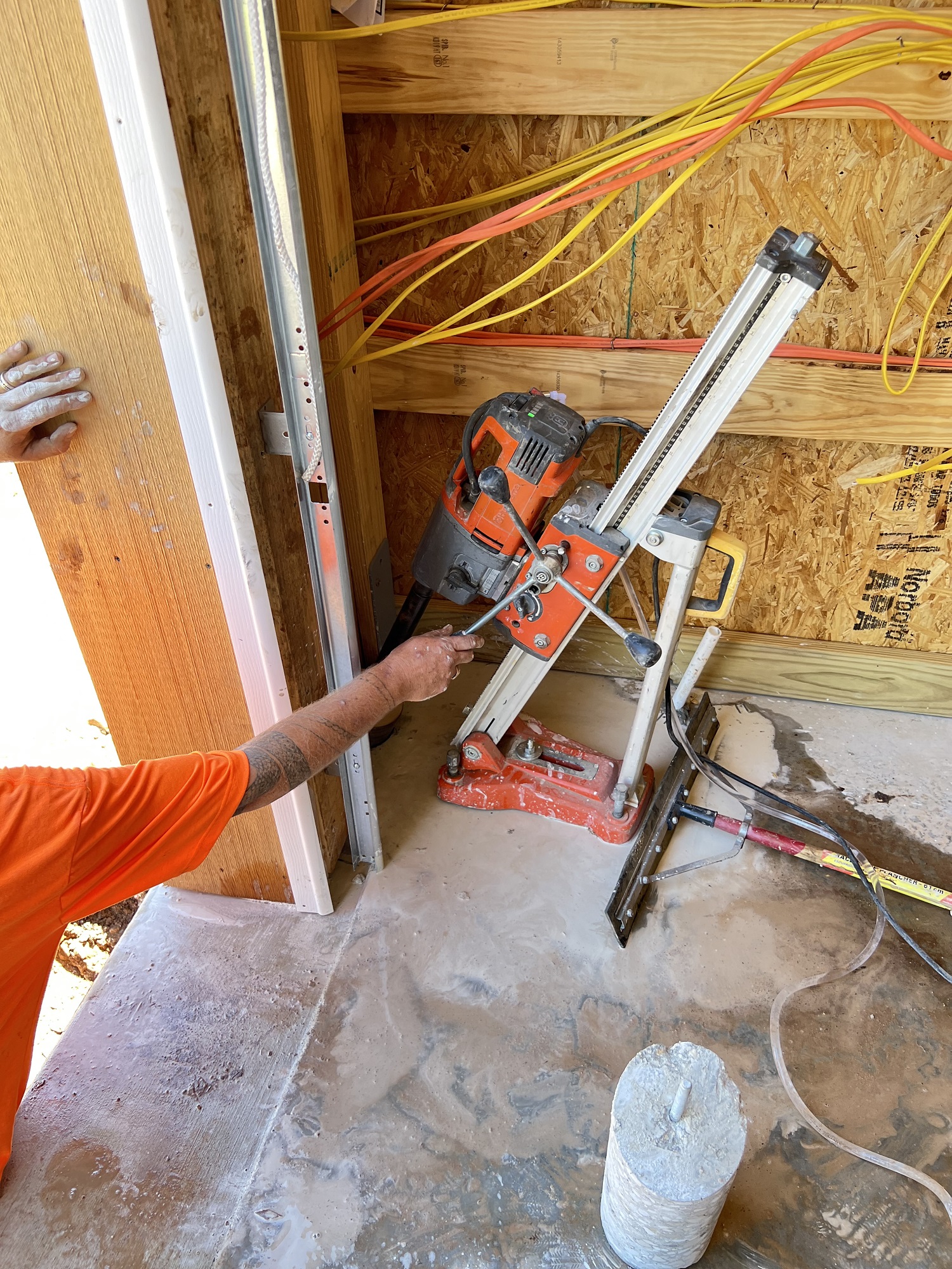 using a core drilling machine on concrete in a corner