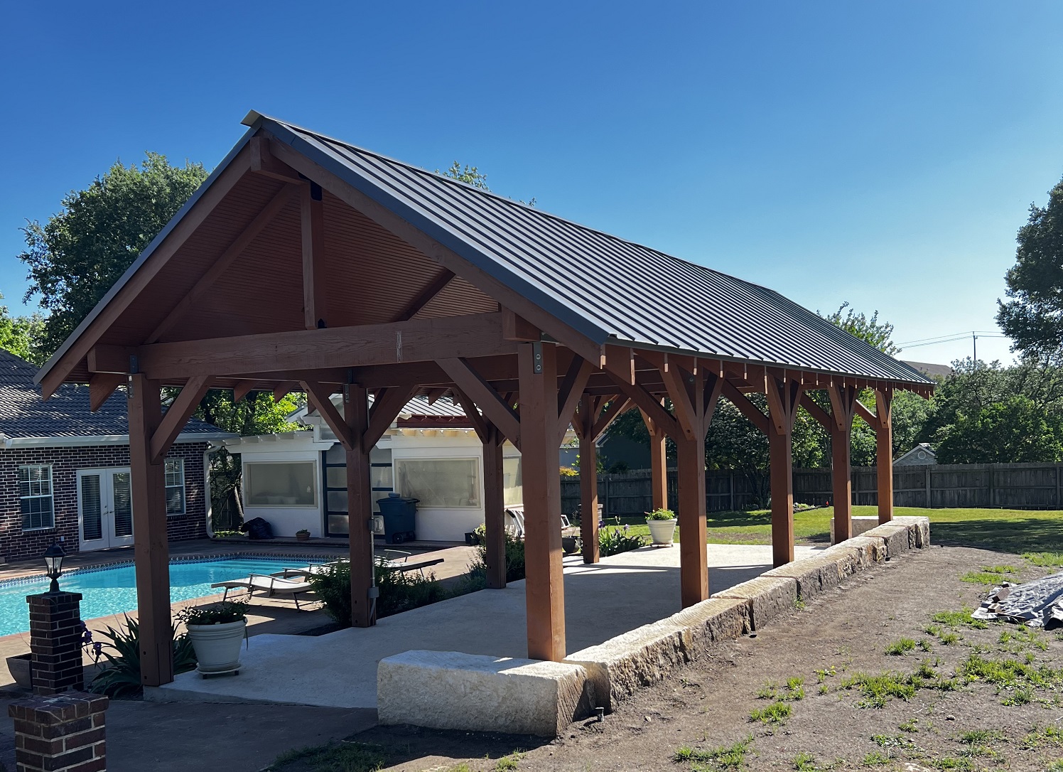 complete outdoor pavilion next to pool complete outdoor pavilion next to pool