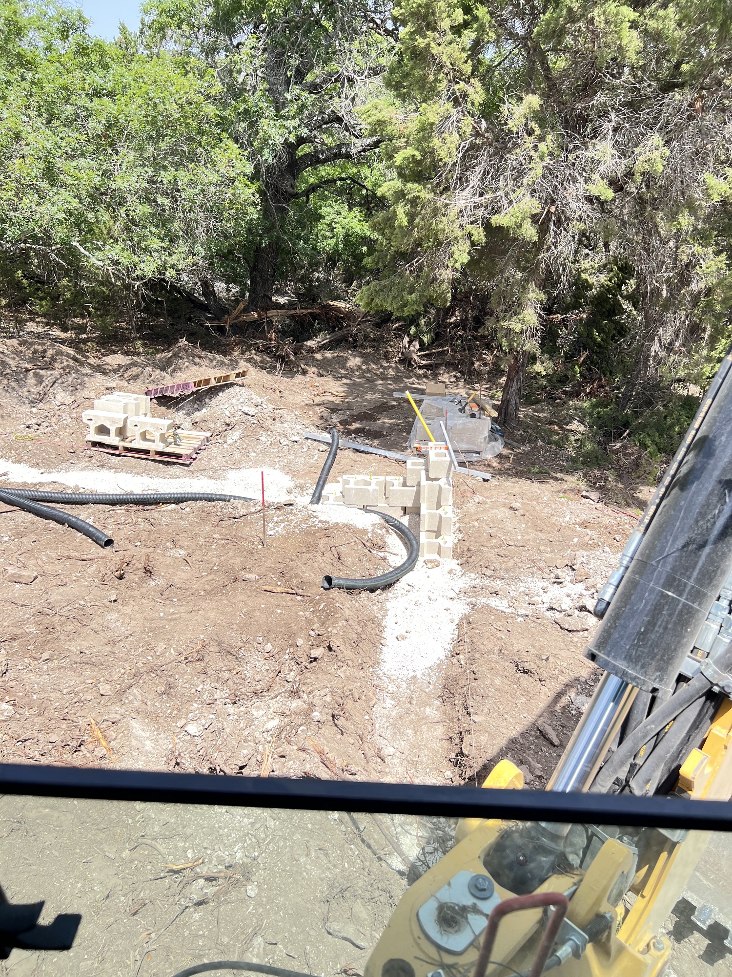 Starting to build a block retaining wall that will be quite tall in the end
