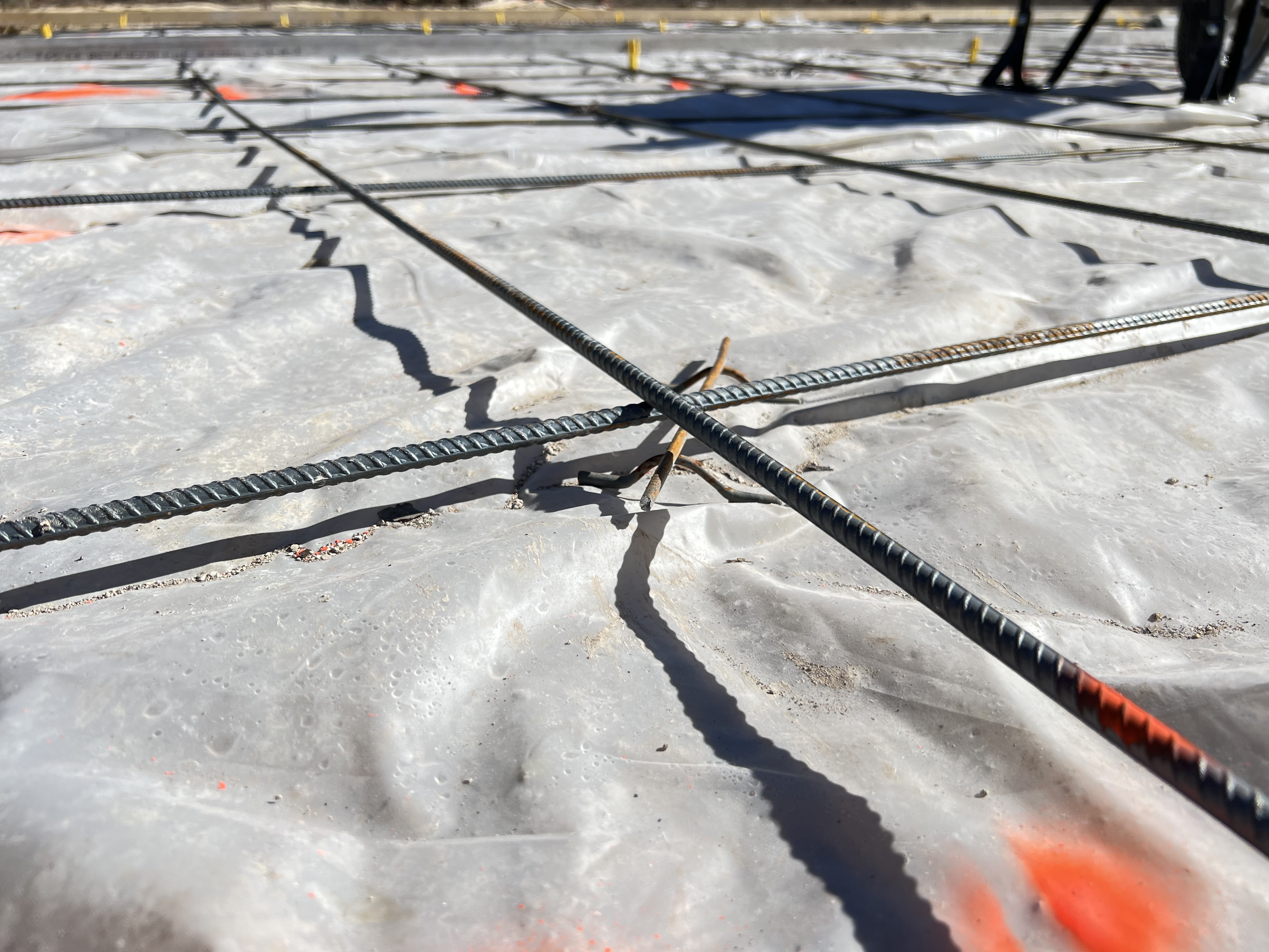 concrete rebar cross bars before a foundation pour